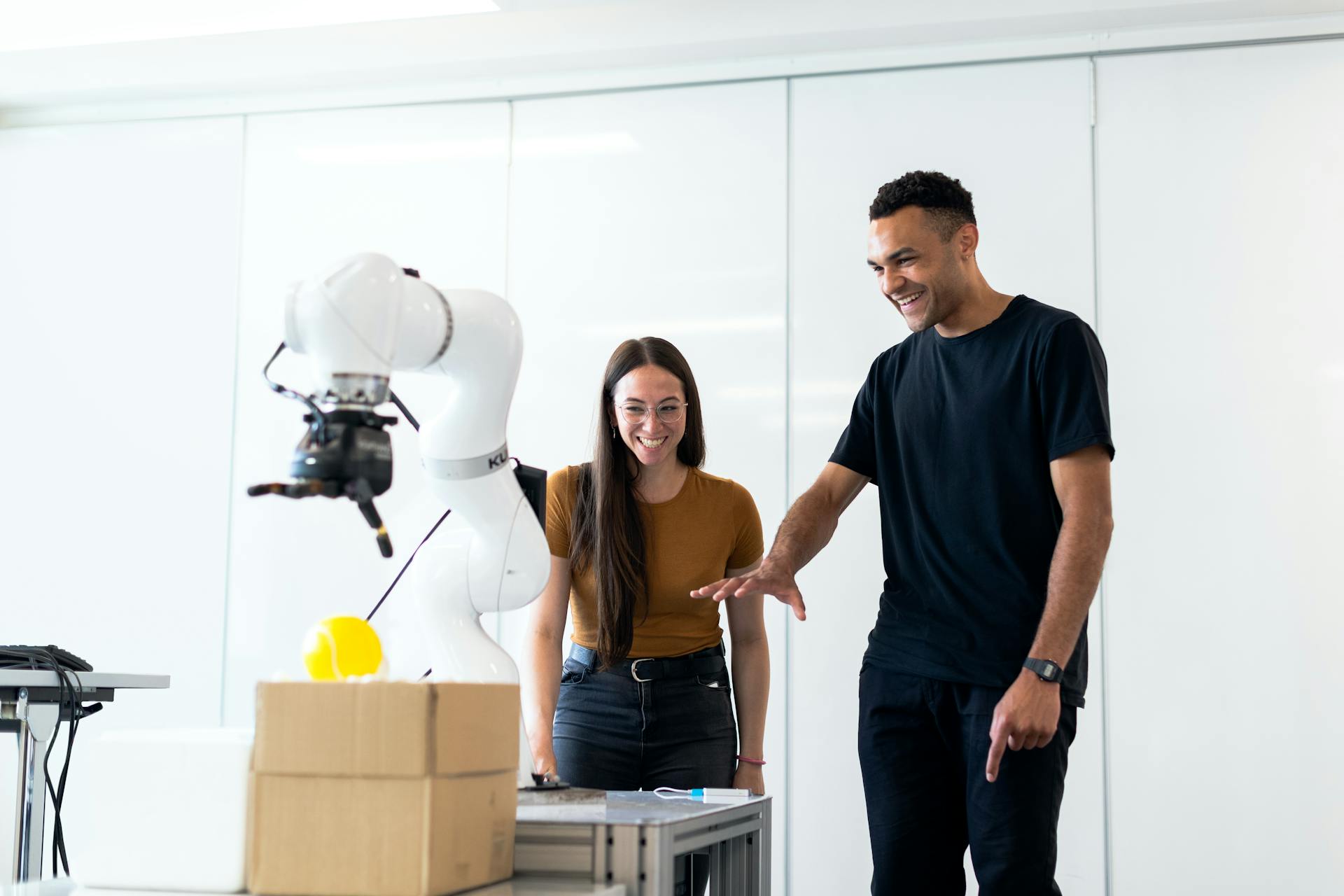 Engineer working with AI and machine learning technologies on multiple screens