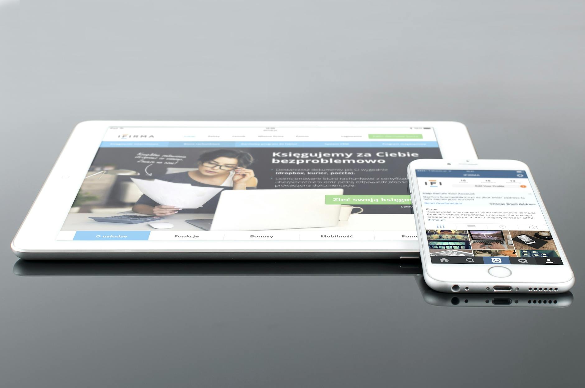 Mobile application development displayed on smartphone and tablet devices