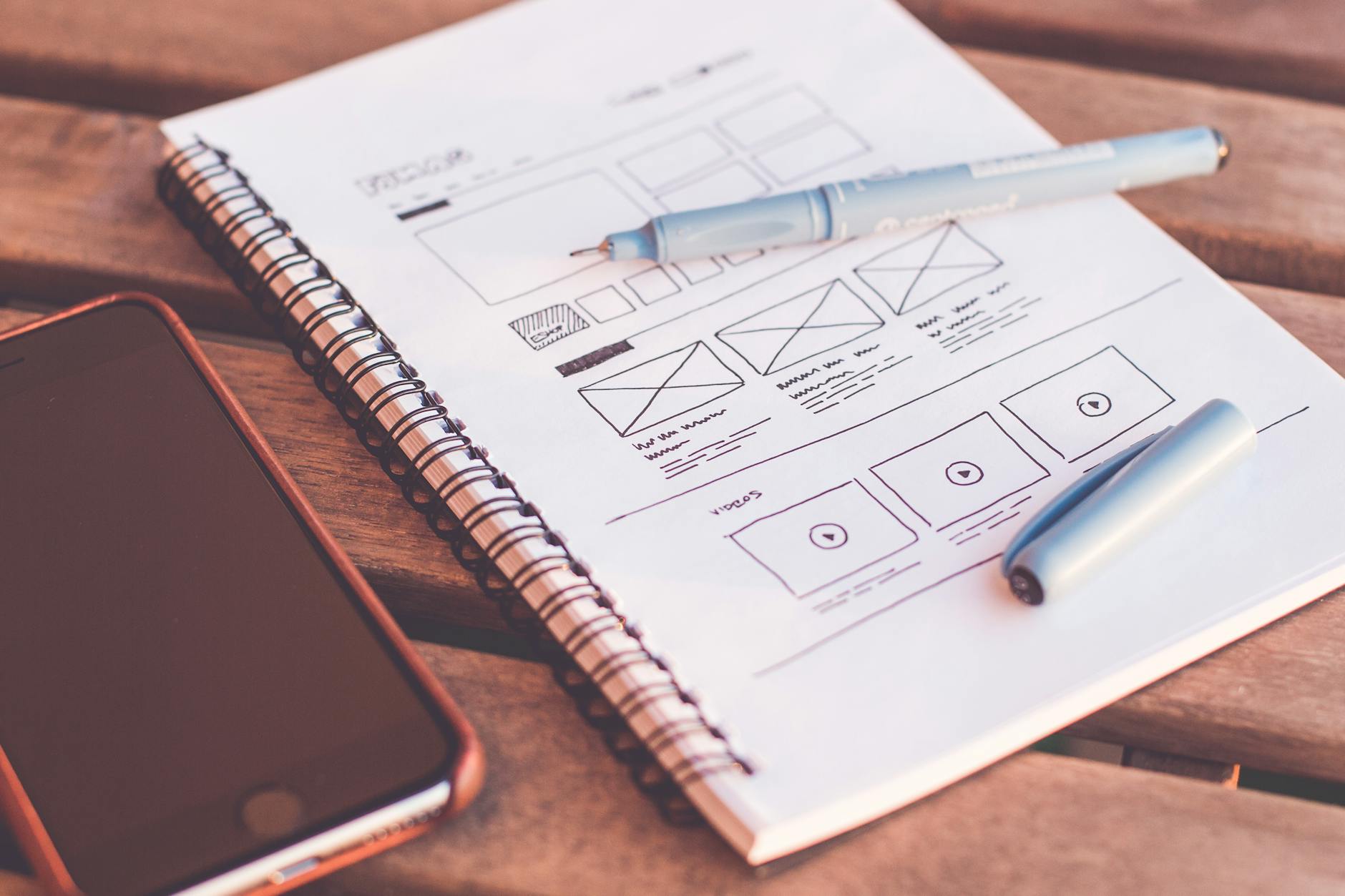 UX designer creating wireframes and prototypes on a digital tablet
