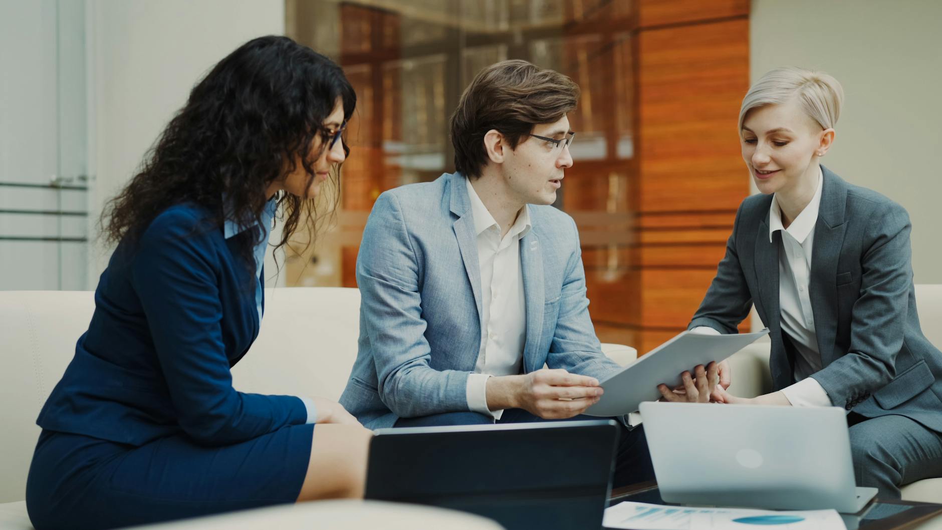 Client and software development team collaborating on project planning